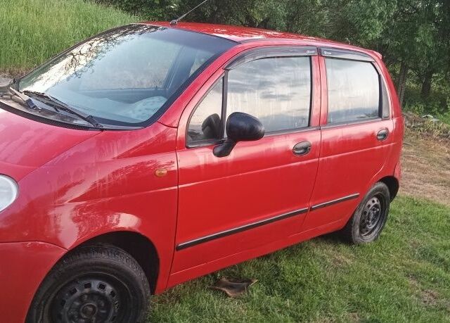 Красный Дэу Матиз, объемом двигателя 0.8 л и пробегом 123 тыс. км за 1100 $, фото 1 на Automoto.ua