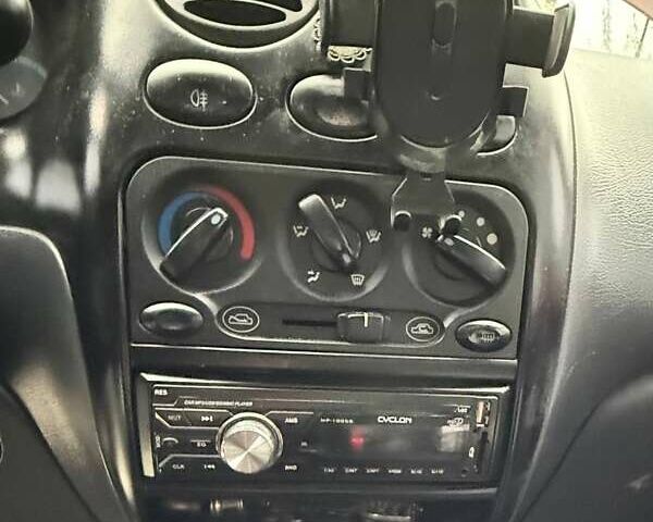 Красный Дэу Матиз, объемом двигателя 0.8 л и пробегом 111 тыс. км за 2000 $, фото 4 на Automoto.ua