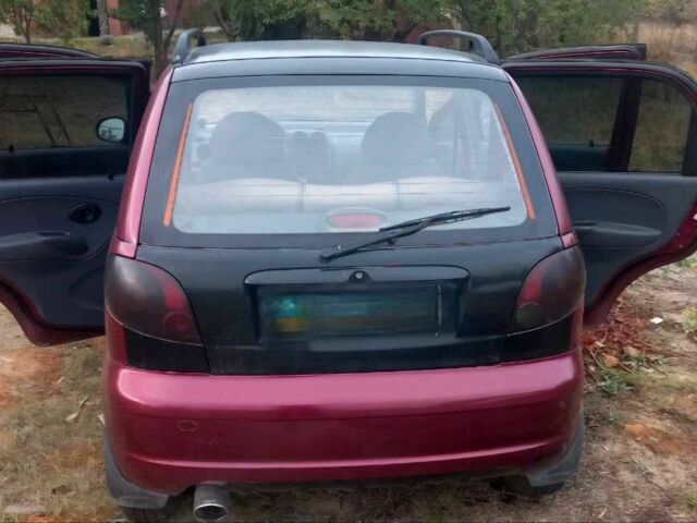 Красный Дэу Матиз, объемом двигателя 0.8 л и пробегом 121 тыс. км за 3000 $, фото 7 на Automoto.ua