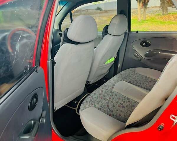 Красный Дэу Матиз, объемом двигателя 0.8 л и пробегом 130 тыс. км за 3000 $, фото 10 на Automoto.ua