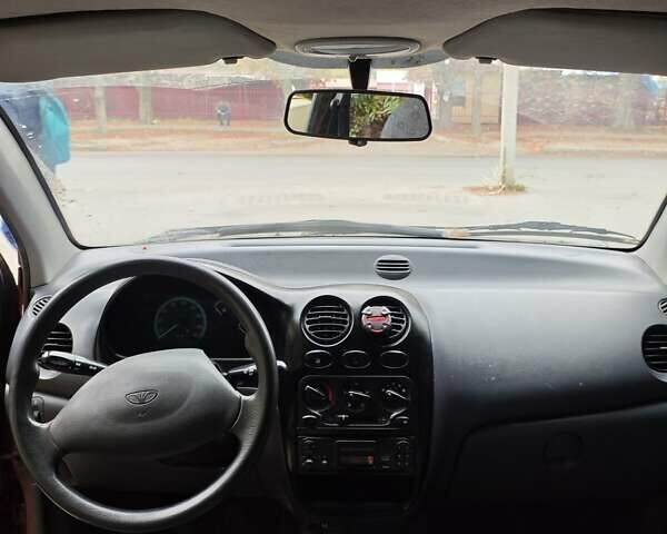 Красный Дэу Матиз, объемом двигателя 0.8 л и пробегом 125 тыс. км за 1800 $, фото 1 на Automoto.ua
