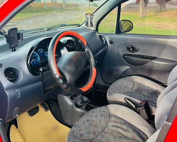 Красный Дэу Матиз, объемом двигателя 0.8 л и пробегом 130 тыс. км за 3000 $, фото 1 на Automoto.ua