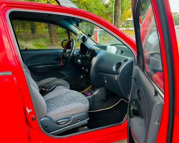 Красный Дэу Матиз, объемом двигателя 0.8 л и пробегом 130 тыс. км за 3000 $, фото 4 на Automoto.ua