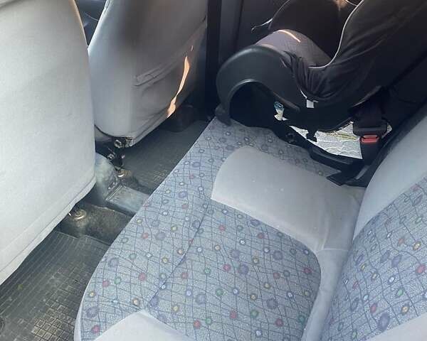 Красный Дэу Матиз, объемом двигателя 0.8 л и пробегом 151 тыс. км за 2000 $, фото 2 на Automoto.ua