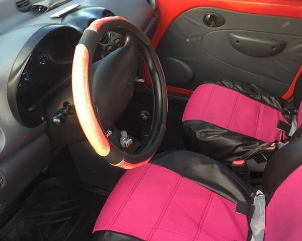 Красный Дэу Матиз, объемом двигателя 0.8 л и пробегом 130 тыс. км за 2000 $, фото 8 на Automoto.ua