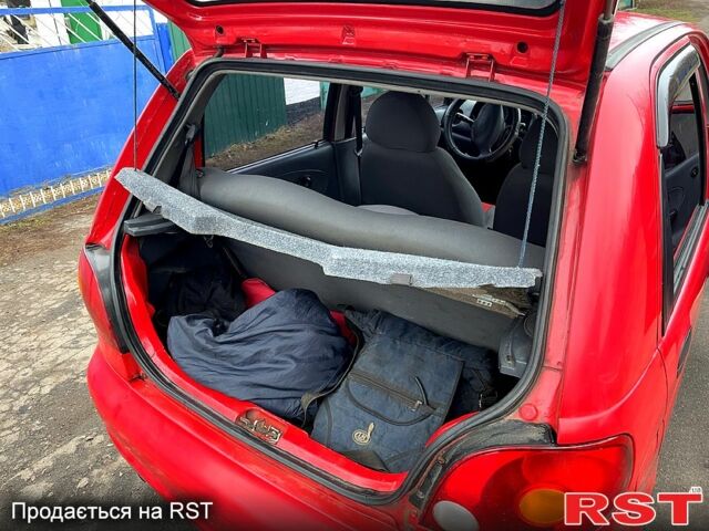 Красный Дэу Матиз, объемом двигателя 0.8 л и пробегом 165 тыс. км за 2300 $, фото 3 на Automoto.ua