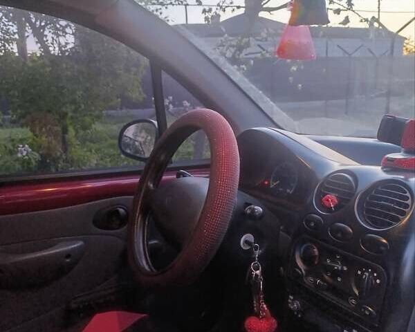 Красный Дэу Матиз, объемом двигателя 0.8 л и пробегом 56 тыс. км за 2400 $, фото 4 на Automoto.ua