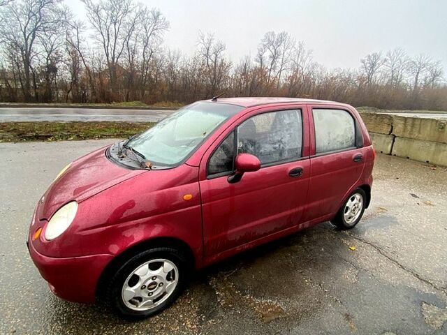 Красный Дэу Матиз, объемом двигателя 0.8 л и пробегом 250 тыс. км за 1800 $, фото 1 на Automoto.ua