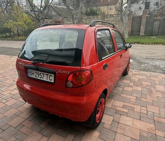 Красный Дэу Матиз, объемом двигателя 0.8 л и пробегом 64 тыс. км за 3300 $, фото 1 на Automoto.ua