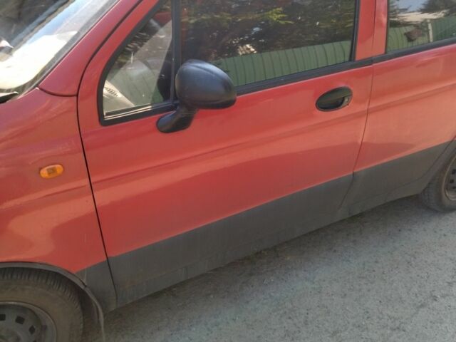 Красный Дэу Матиз, объемом двигателя 0.8 л и пробегом 157 тыс. км за 2300 $, фото 5 на Automoto.ua