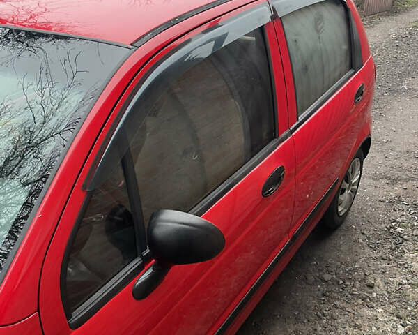 Красный Дэу Матиз, объемом двигателя 0.8 л и пробегом 103 тыс. км за 2400 $, фото 2 на Automoto.ua