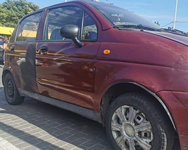 Красный Дэу Матиз, объемом двигателя 0.8 л и пробегом 200 тыс. км за 1250 $, фото 7 на Automoto.ua