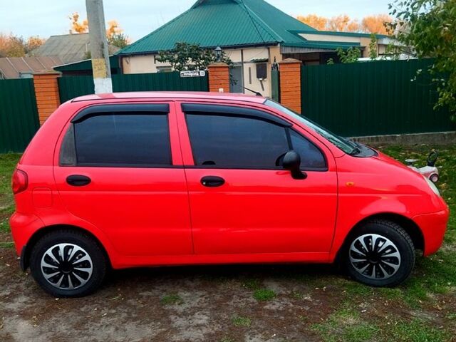 Красный Дэу Матиз, объемом двигателя 0.8 л и пробегом 98 тыс. км за 2150 $, фото 1 на Automoto.ua