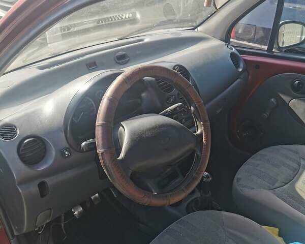 Красный Дэу Матиз, объемом двигателя 0.8 л и пробегом 200 тыс. км за 1250 $, фото 1 на Automoto.ua