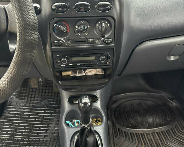 Красный Дэу Матиз, объемом двигателя 0.8 л и пробегом 91 тыс. км за 1900 $, фото 16 на Automoto.ua