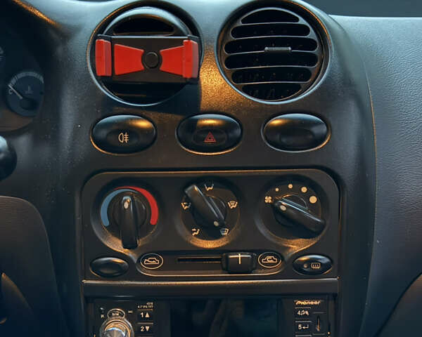 Червоний Деу Матіз, об'ємом двигуна 0.8 л та пробігом 107 тис. км за 2000 $, фото 8 на Automoto.ua