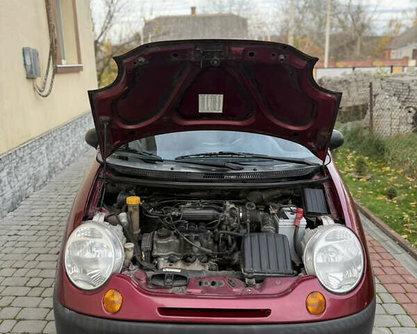 Червоний Деу Матіз, об'ємом двигуна 0.8 л та пробігом 107 тис. км за 2000 $, фото 15 на Automoto.ua