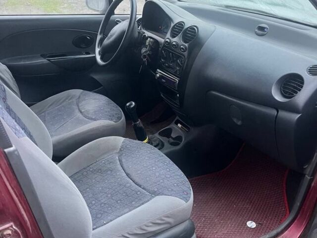 Красный Дэу Матиз, объемом двигателя 0.8 л и пробегом 100 тыс. км за 1000 $, фото 5 на Automoto.ua