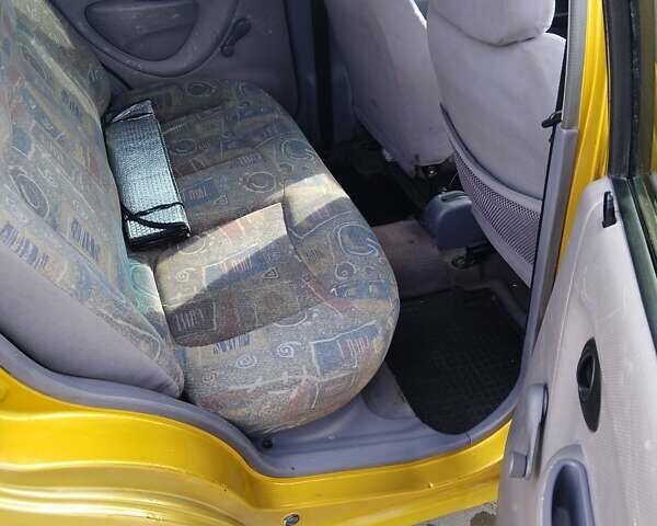 Желтый Дэу Матиз, объемом двигателя 0.8 л и пробегом 165 тыс. км за 1400 $, фото 16 на Automoto.ua