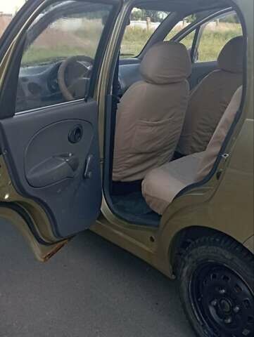 Желтый Дэу Матиз, объемом двигателя 0.8 л и пробегом 200 тыс. км за 1100 $, фото 1 на Automoto.ua