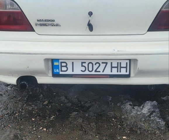 Белый Дэу Нексия, объемом двигателя 1.5 л и пробегом 112 тыс. км за 1300 $, фото 3 на Automoto.ua