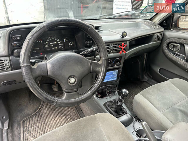 Белый Дэу Нексия, объемом двигателя 1.5 л и пробегом 267 тыс. км за 1250 $, фото 9 на Automoto.ua
