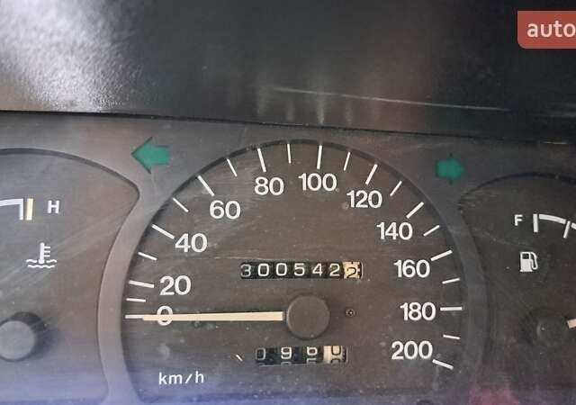 Белый Дэу Нексия, объемом двигателя 1.5 л и пробегом 305 тыс. км за 1600 $, фото 3 на Automoto.ua