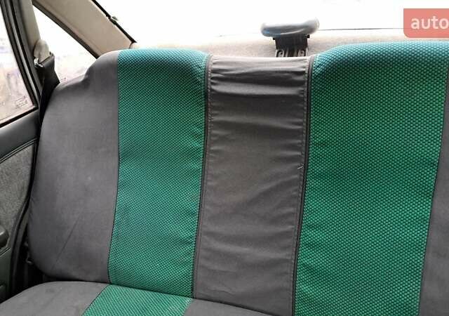 Белый Дэу Нексия, объемом двигателя 1.5 л и пробегом 305 тыс. км за 1600 $, фото 5 на Automoto.ua