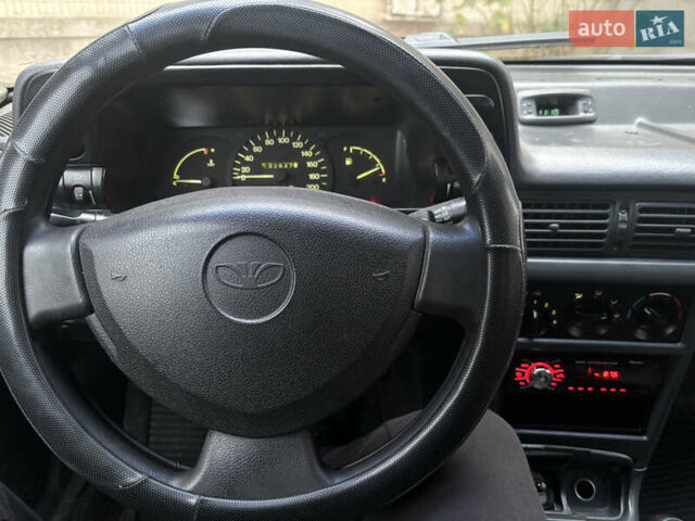 Белый Дэу Нексия, объемом двигателя 1.5 л и пробегом 249 тыс. км за 1600 $, фото 2 на Automoto.ua