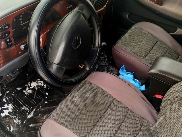 Белый Дэу Нексия, объемом двигателя 1.5 л и пробегом 250 тыс. км за 1290 $, фото 6 на Automoto.ua