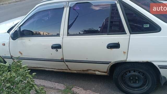 Белый Дэу Нексия, объемом двигателя 1.5 л и пробегом 225 тыс. км за 700 $, фото 7 на Automoto.ua
