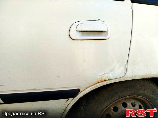 Белый Дэу Нексия, объемом двигателя 1.5 л и пробегом 190 тыс. км за 1200 $, фото 9 на Automoto.ua