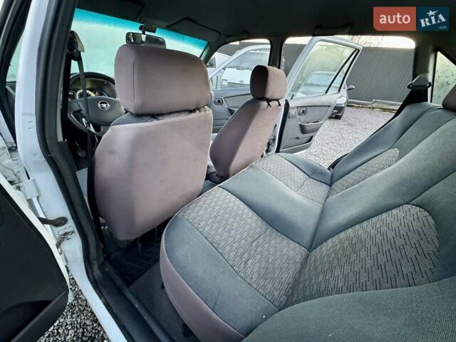 Белый Дэу Нексия, объемом двигателя 1.5 л и пробегом 209 тыс. км за 2399 $, фото 24 на Automoto.ua