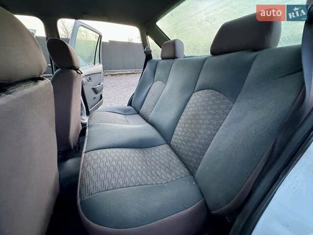 Белый Дэу Нексия, объемом двигателя 1.5 л и пробегом 209 тыс. км за 2399 $, фото 25 на Automoto.ua