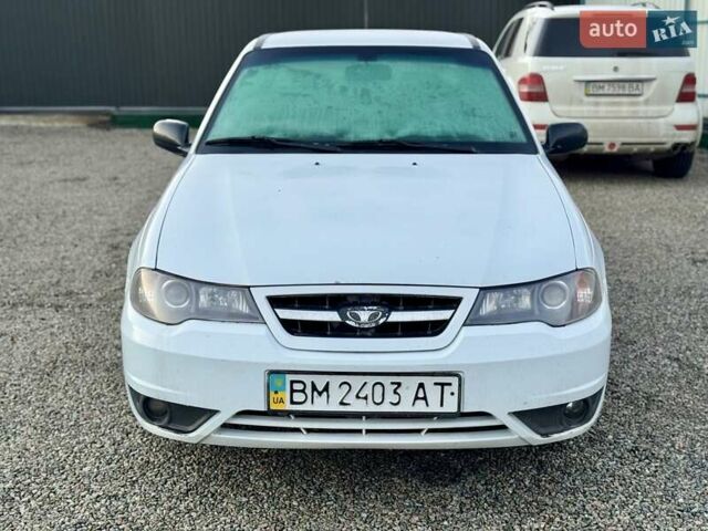 Белый Дэу Нексия, объемом двигателя 1.5 л и пробегом 209 тыс. км за 2399 $, фото 3 на Automoto.ua
