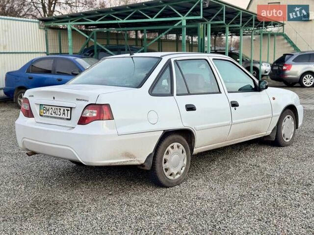 Белый Дэу Нексия, объемом двигателя 1.5 л и пробегом 209 тыс. км за 2399 $, фото 9 на Automoto.ua