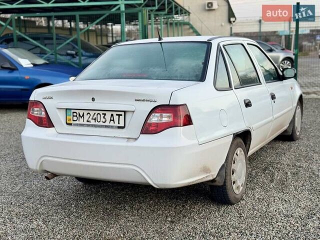 Белый Дэу Нексия, объемом двигателя 1.5 л и пробегом 209 тыс. км за 2399 $, фото 10 на Automoto.ua