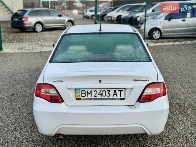 Белый Дэу Нексия, объемом двигателя 1.5 л и пробегом 209 тыс. км за 2399 $, фото 12 на Automoto.ua