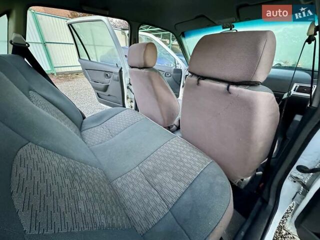 Белый Дэу Нексия, объемом двигателя 1.5 л и пробегом 209 тыс. км за 2399 $, фото 27 на Automoto.ua