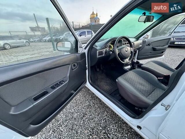 Белый Дэу Нексия, объемом двигателя 1.5 л и пробегом 209 тыс. км за 2399 $, фото 18 на Automoto.ua