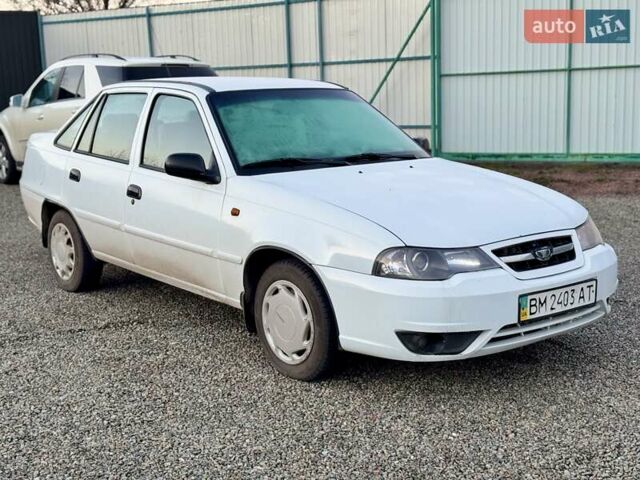 Белый Дэу Нексия, объемом двигателя 1.5 л и пробегом 209 тыс. км за 2399 $, фото 6 на Automoto.ua