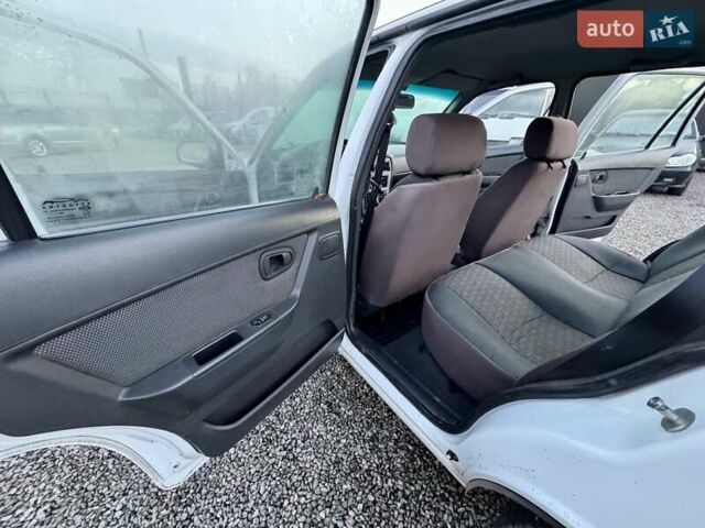 Белый Дэу Нексия, объемом двигателя 1.5 л и пробегом 209 тыс. км за 2399 $, фото 22 на Automoto.ua