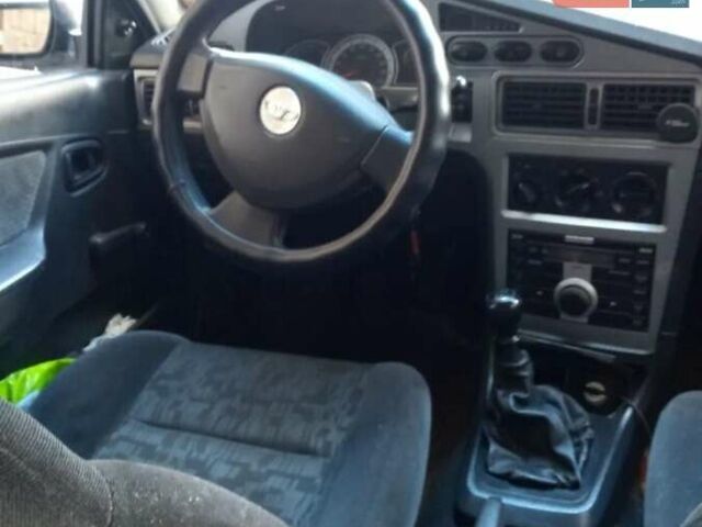 Белый Дэу Нексия, объемом двигателя 1.6 л и пробегом 325 тыс. км за 1300 $, фото 3 на Automoto.ua