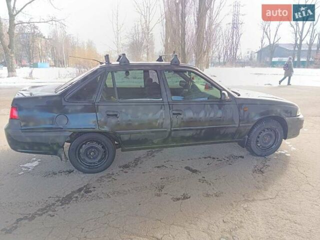 Белый Дэу Нексия, объемом двигателя 1.5 л и пробегом 256 тыс. км за 1500 $, фото 6 на Automoto.ua