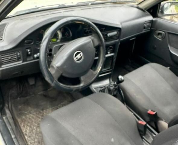 Белый Дэу Нексия, объемом двигателя 2 л и пробегом 170 тыс. км за 950 $, фото 2 на Automoto.ua