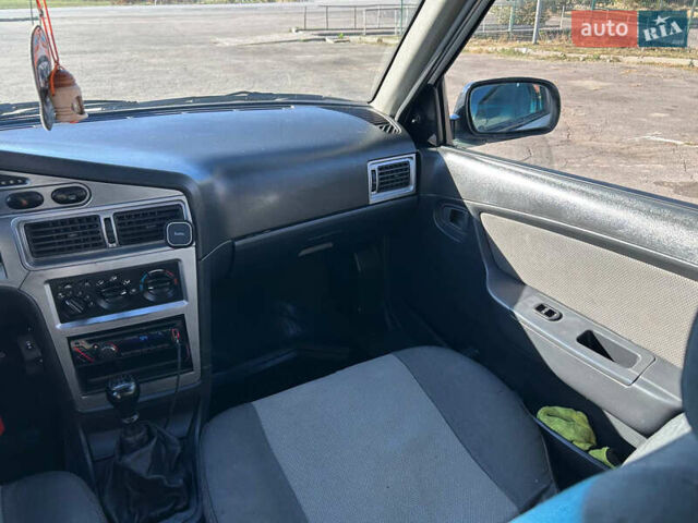 Белый Дэу Нексия, объемом двигателя 1.5 л и пробегом 155 тыс. км за 2300 $, фото 11 на Automoto.ua