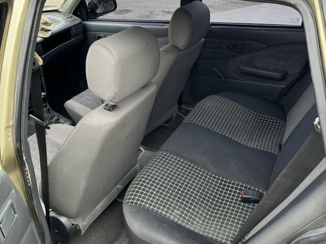 Бежевий Деу Нексія, об'ємом двигуна 1.5 л та пробігом 178 тис. км за 1500 $, фото 7 на Automoto.ua