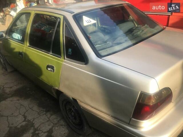 Бежевый Дэу Нексия, объемом двигателя 1.5 л и пробегом 310 тыс. км за 1065 $, фото 3 на Automoto.ua