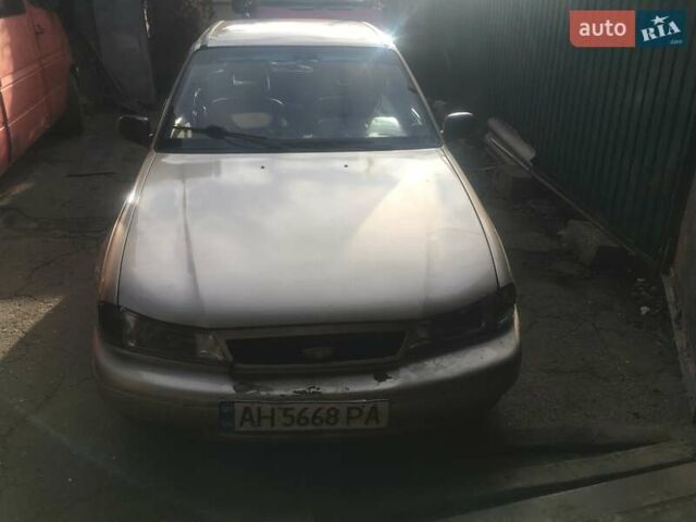 Бежевый Дэу Нексия, объемом двигателя 1.5 л и пробегом 310 тыс. км за 1065 $, фото 1 на Automoto.ua