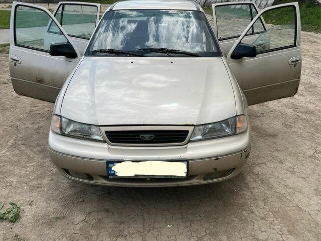 Бежевий Деу Нексія, об'ємом двигуна 1.6 л та пробігом 200 тис. км за 1100 $, фото 12 на Automoto.ua